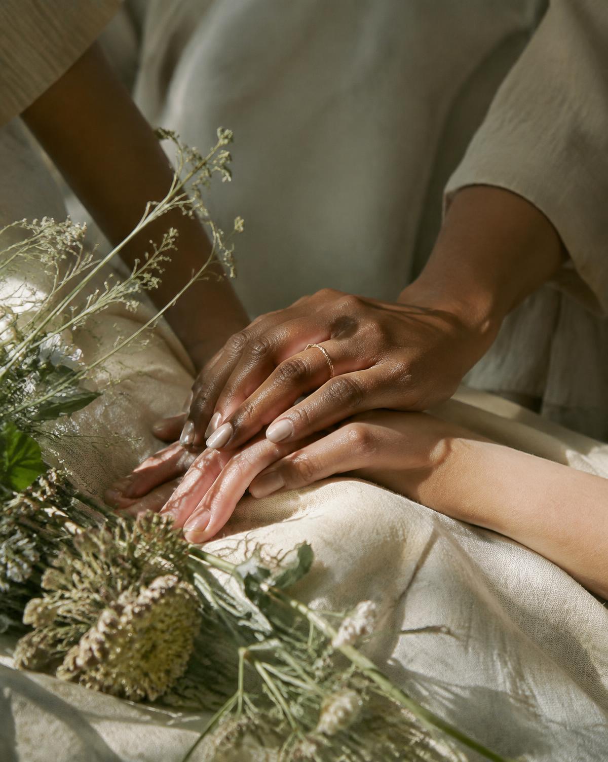 Hands resting in quiet connection